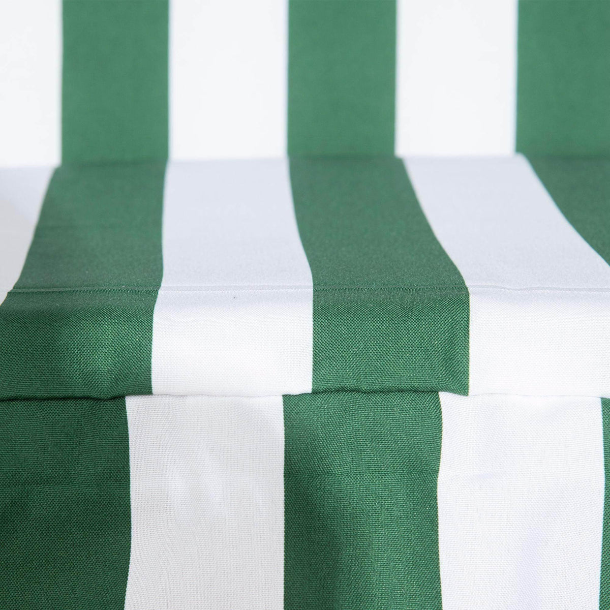 Green and white striped swing chair seat cushion fabric close-up