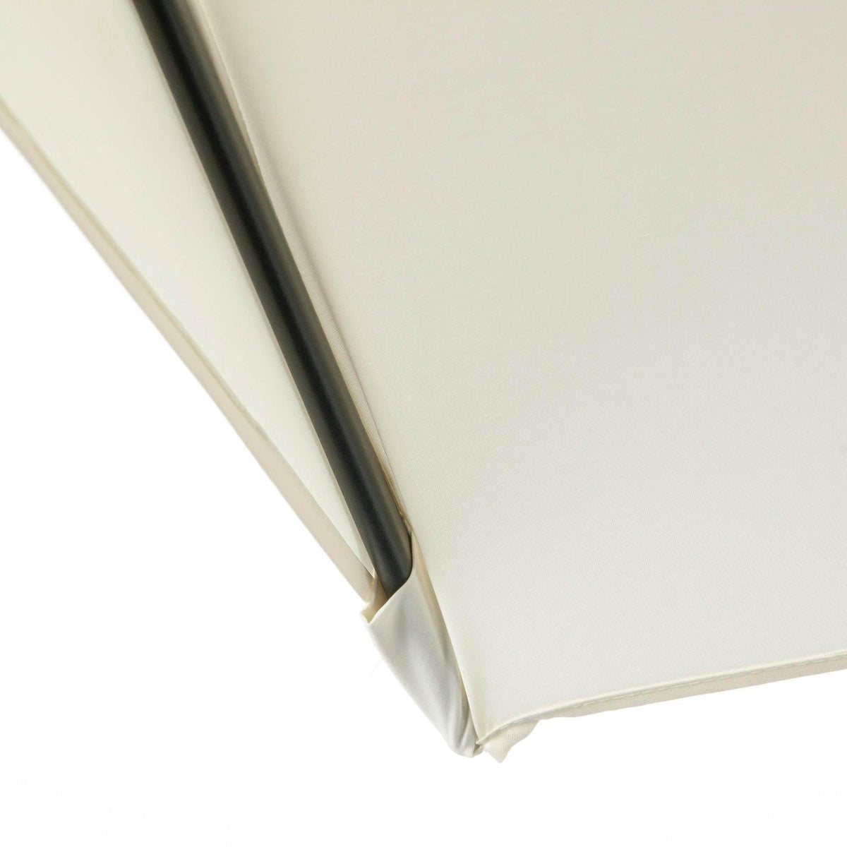 Beige umbrella fabric edge with folded corner and black frame support