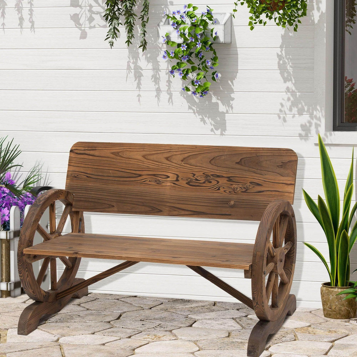 Rustic wooden garden bench with wagon-wheel side frames and curved armrests