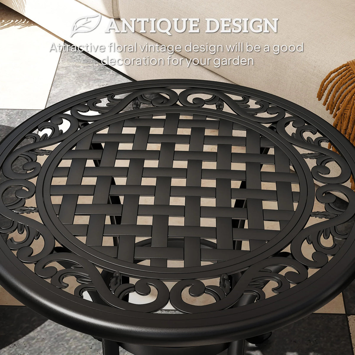 Black cast aluminum round table top with ornate openwork lattice and spiral border