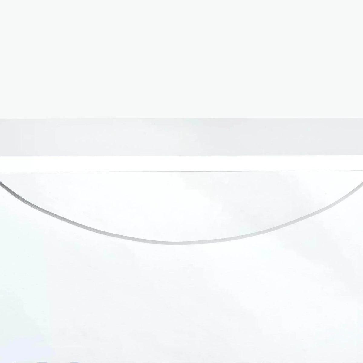 White radiator cover close-up of curved lower cutout