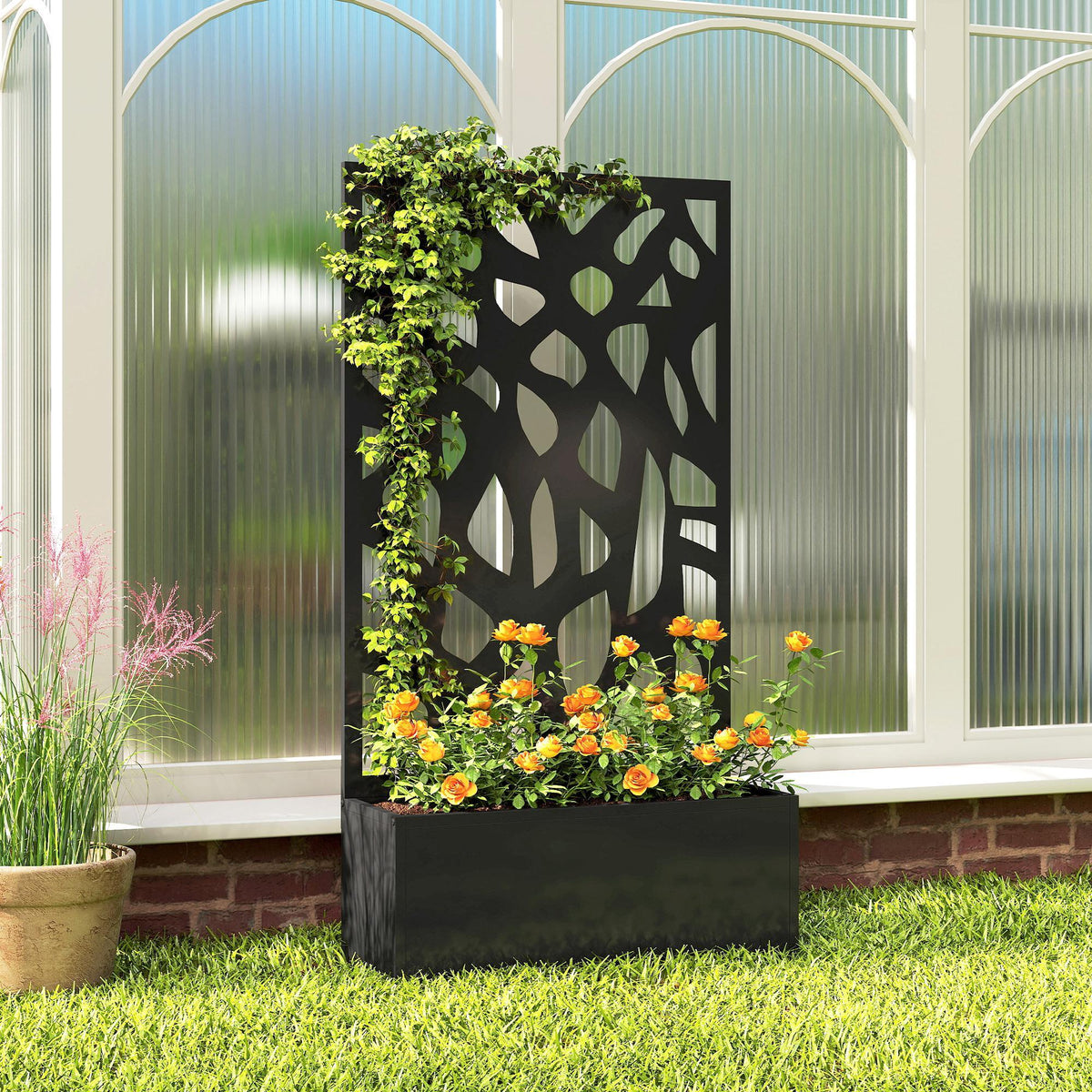 Black metal raised planter with lattice trellis, orange and yellow flowers at base