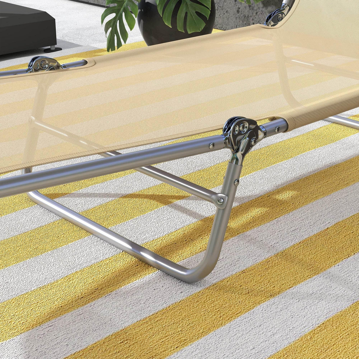 Close-up of beige sun lounger mesh cushion and silver steel crossbars