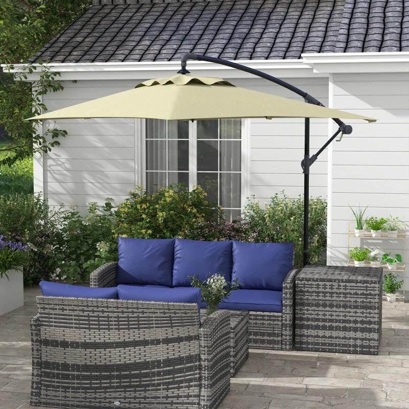 Beige rectangular cantilever patio parasol with cross base and crank arm over seating