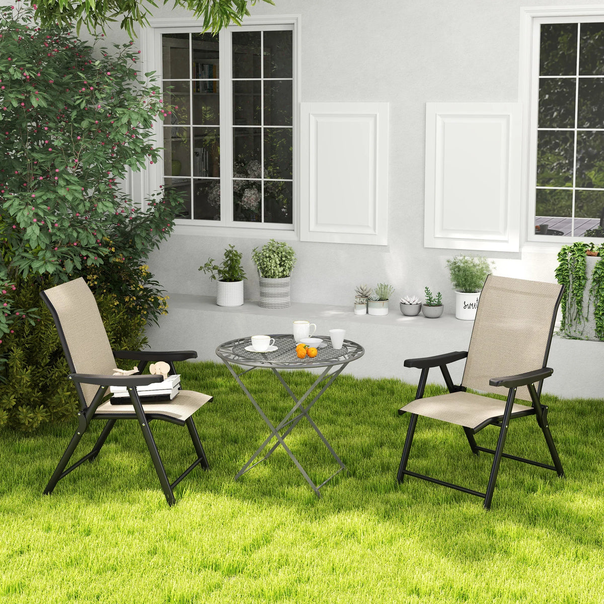 Two outdoor folding chairs with tan breathable mesh seats and black steel frames