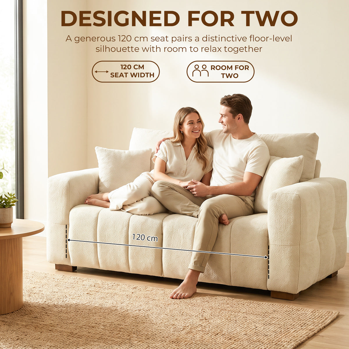 Cream white velvet loveseat sofa for two with two back pillows and wide arms