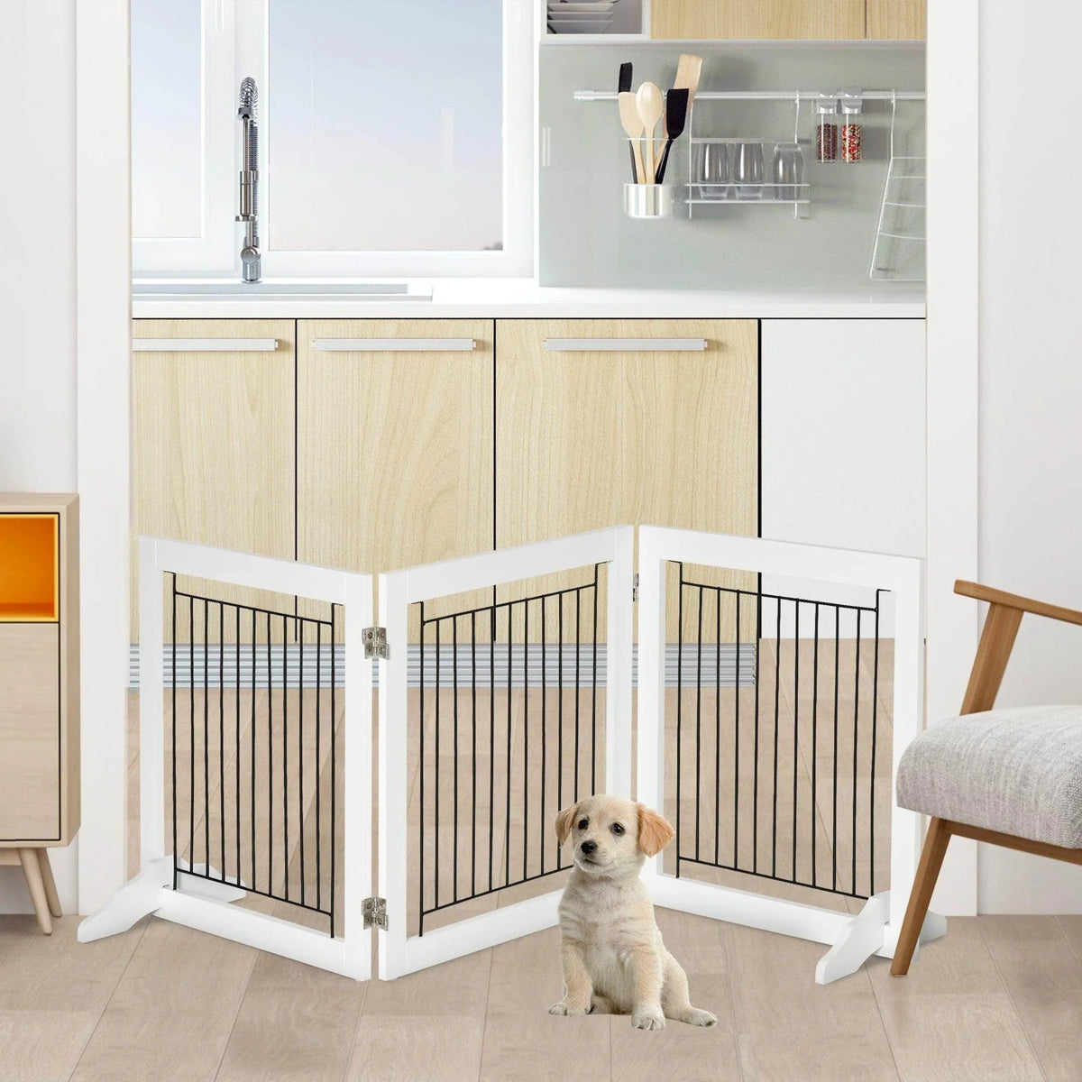 White foldable dog gate with black bars, support feet and hinge joints; pet nearby.
