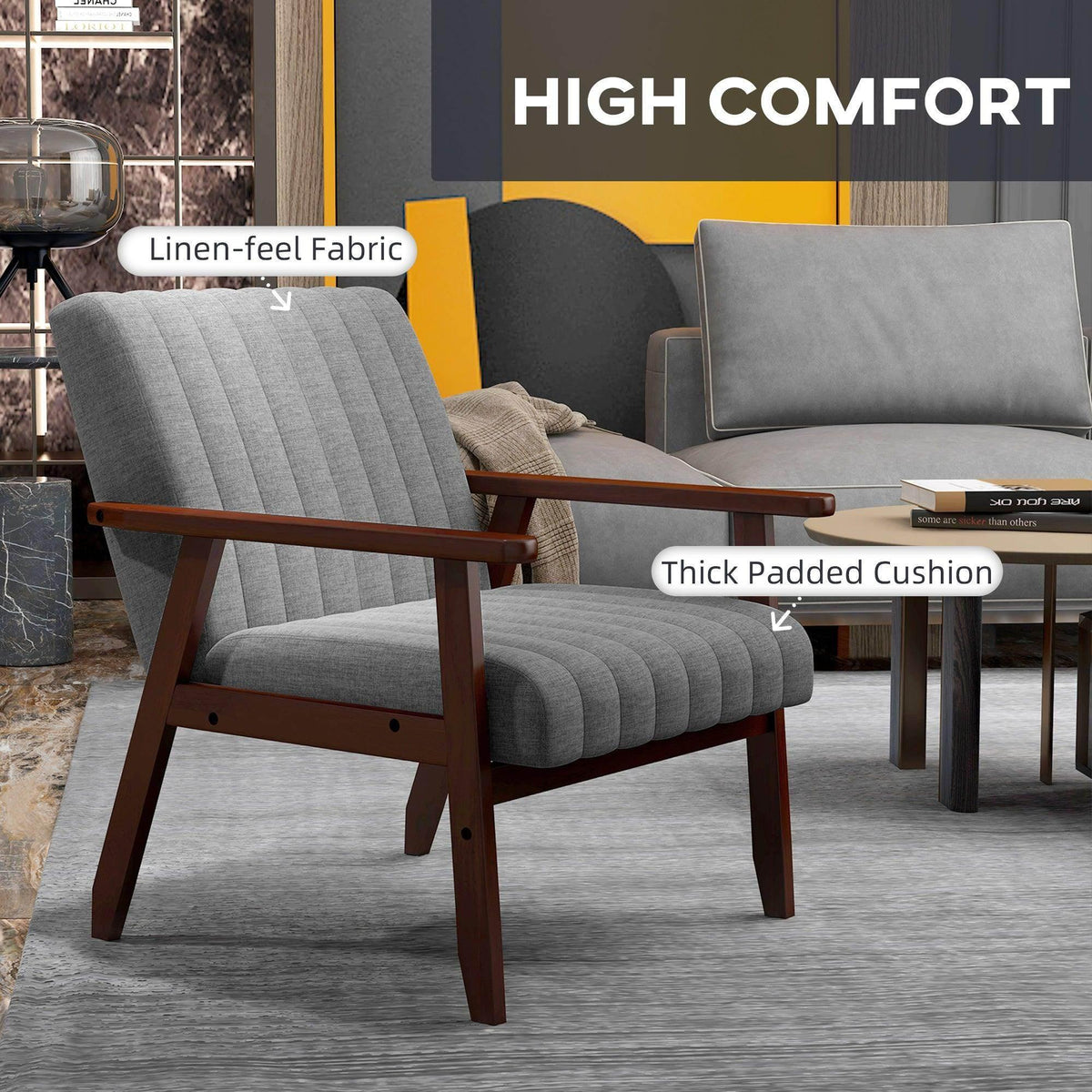 Grey linen-feel accent chair with thick padded cushion and dark wood frame