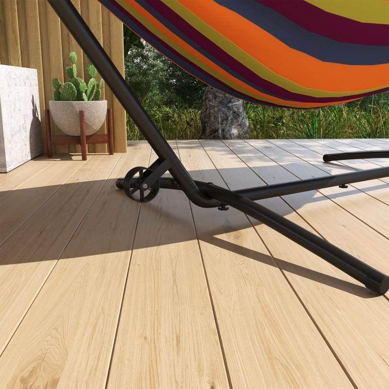 Black hammock stand with wheels under a colorful striped hammock