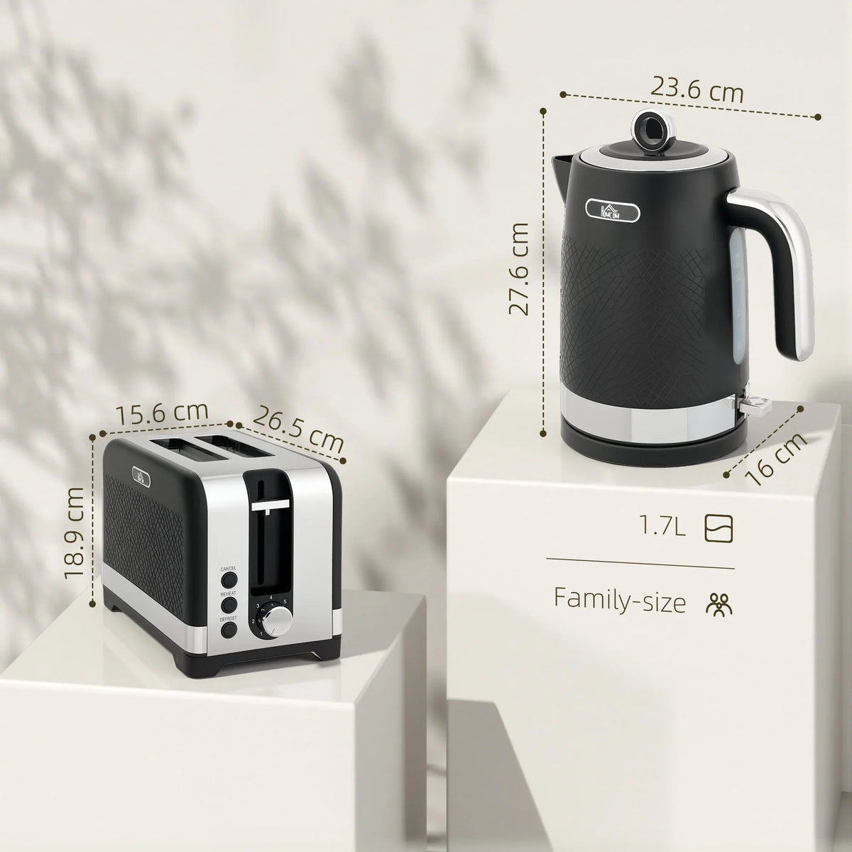 Matte black kettle and toaster set on boxes, shown with size callouts