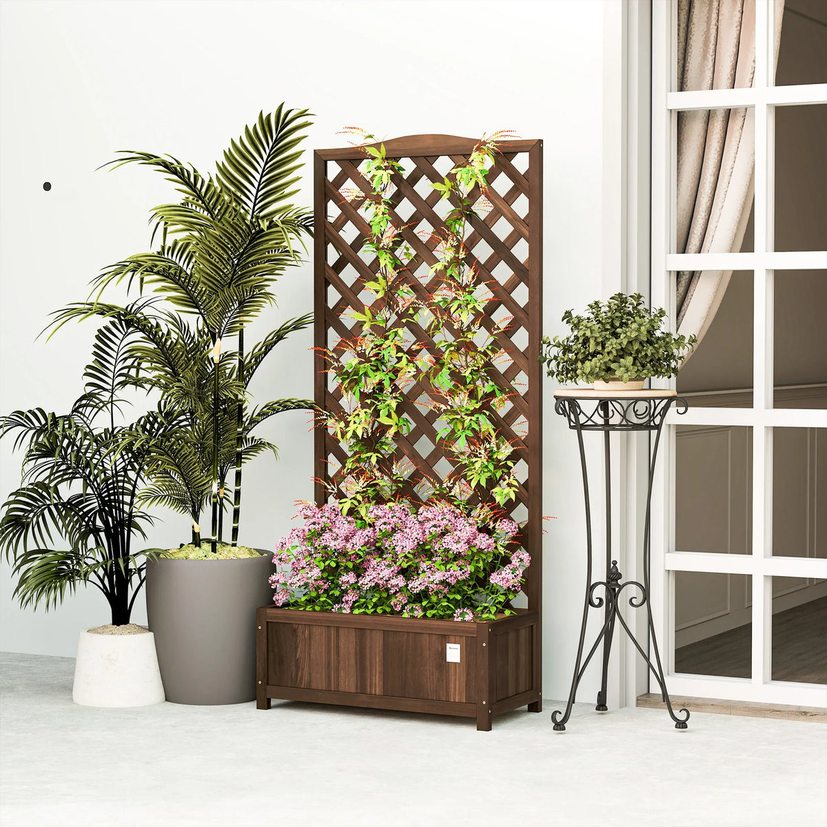 Dark brown freestanding wooden raised planter with lattice trellis beside potted plants