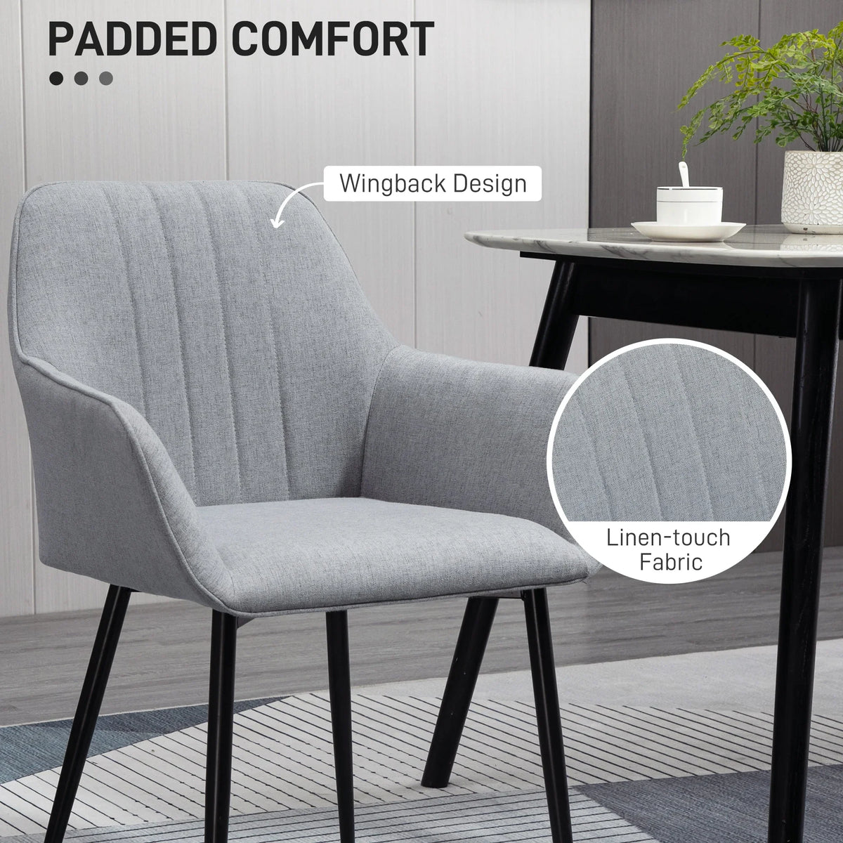 Light grey wingback dining chair with linen-touch fabric and black legs