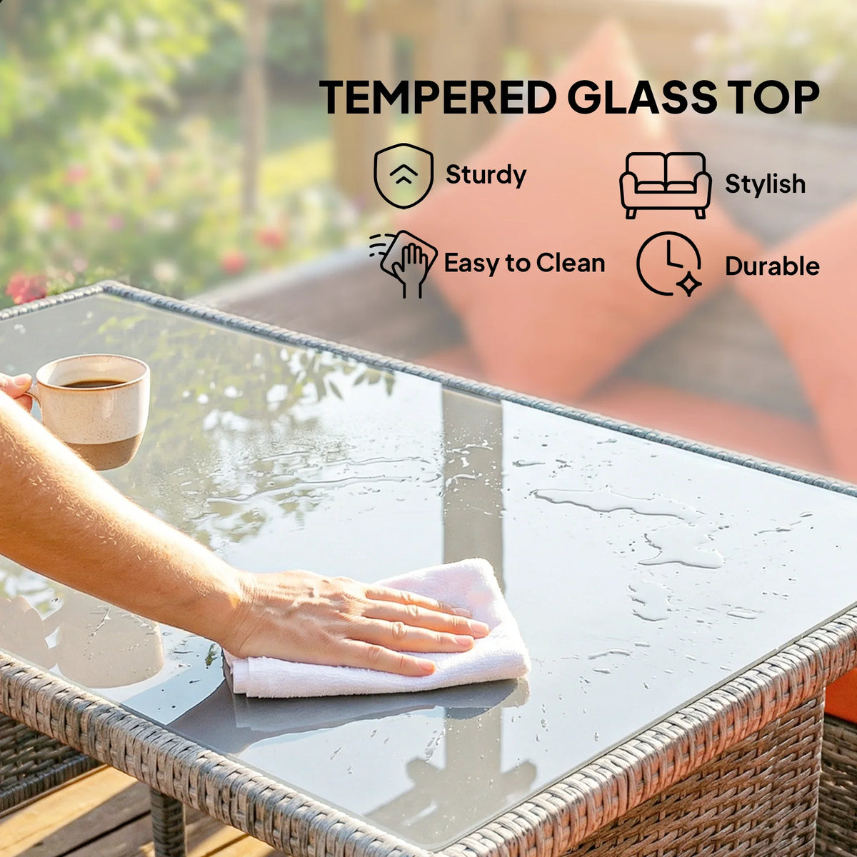 Tempered glass tabletop on gray rattan dining table with woven trim