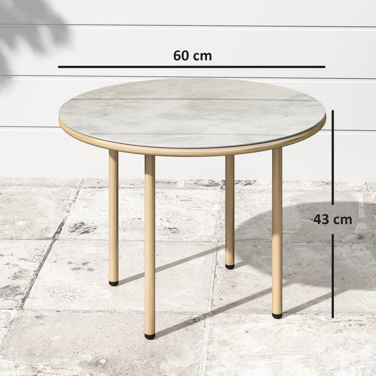 Round beige faux marble coffee table with gold legs and smooth tabletop surface