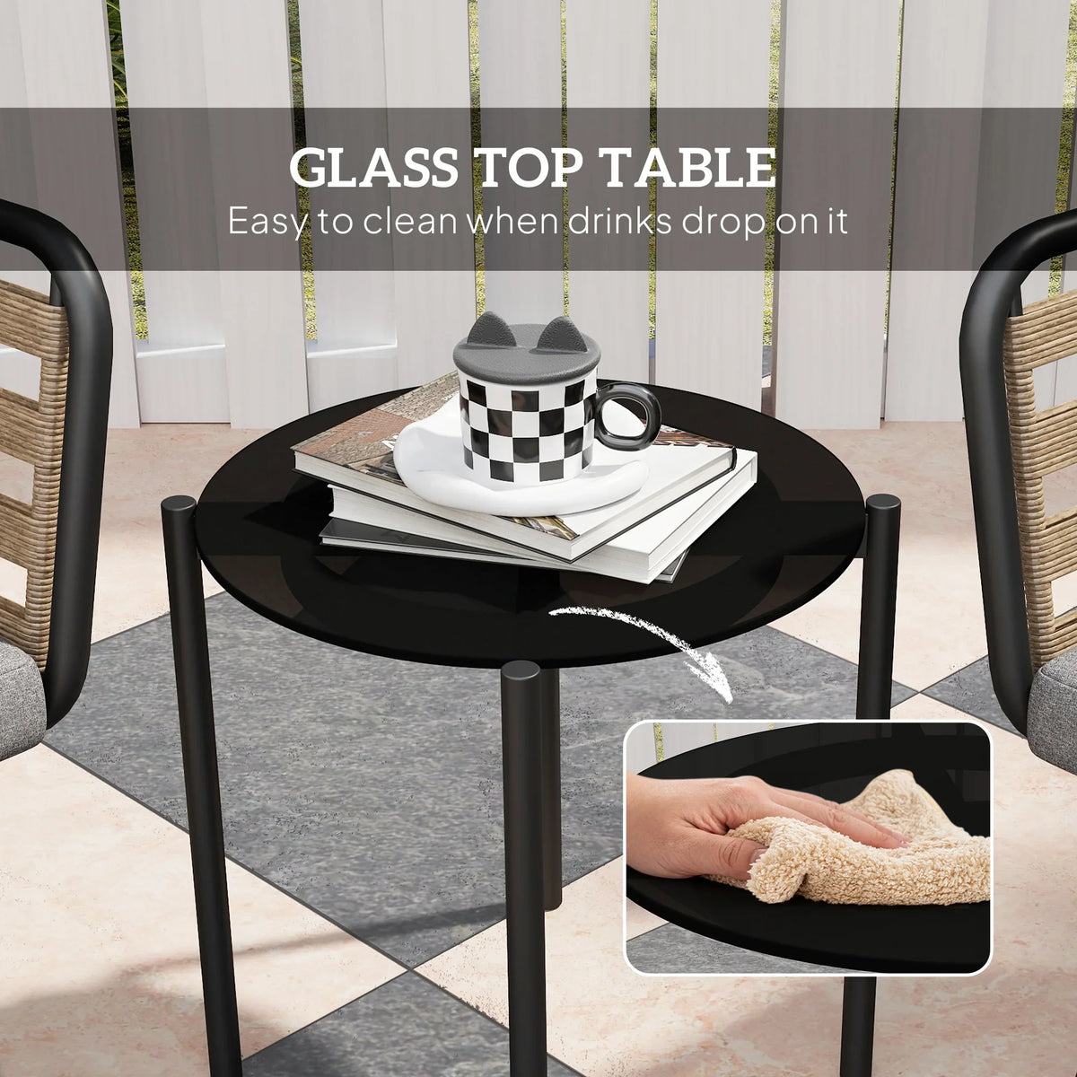 Round glass-top coffee table in black with serving tray and check mug