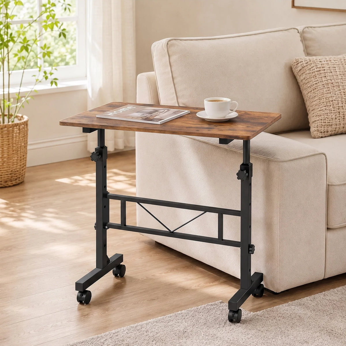 Height-adjustable overbed table with brown wood top and sturdy black caster legs
