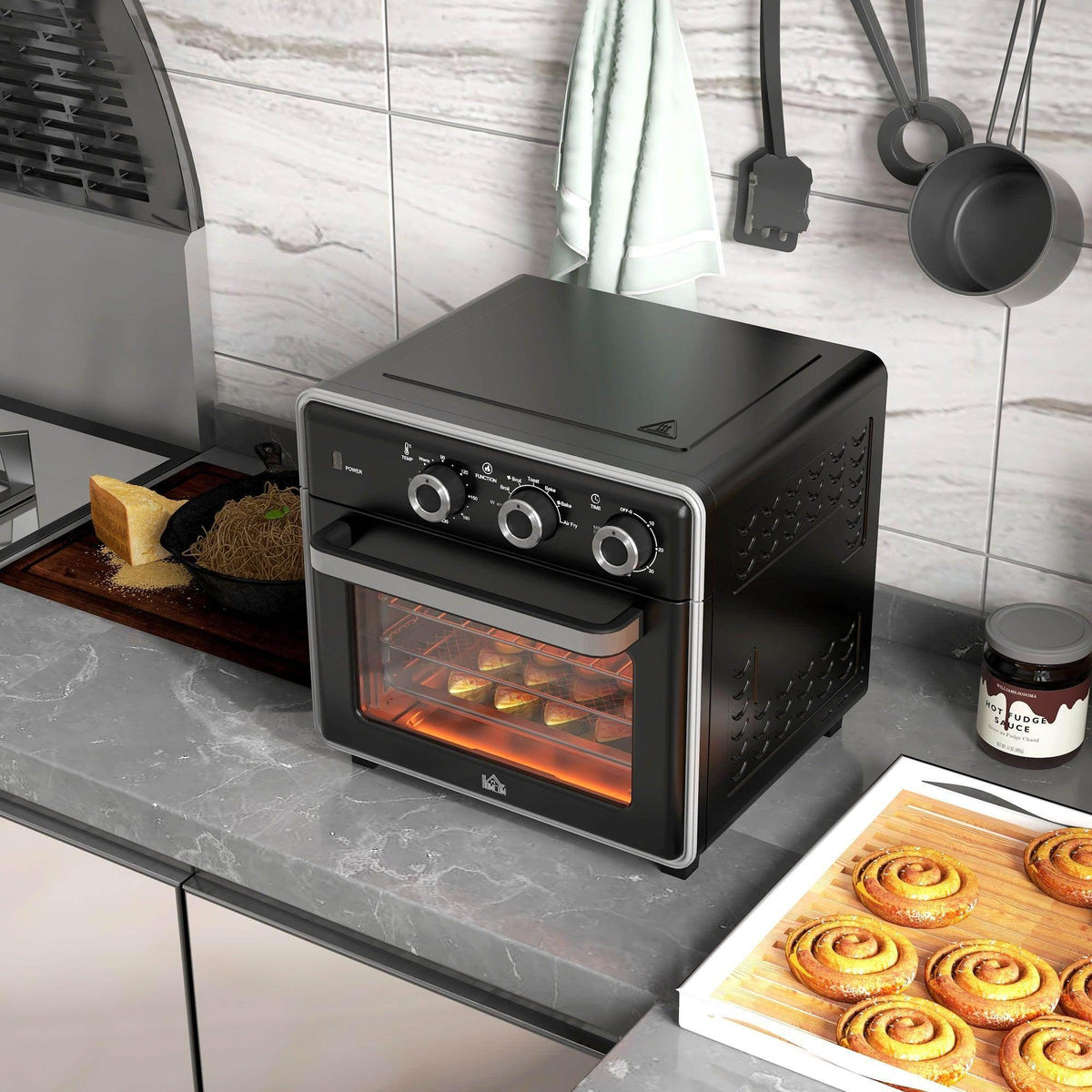 Black countertop air fryer oven with glass door and front rotary control knobs
