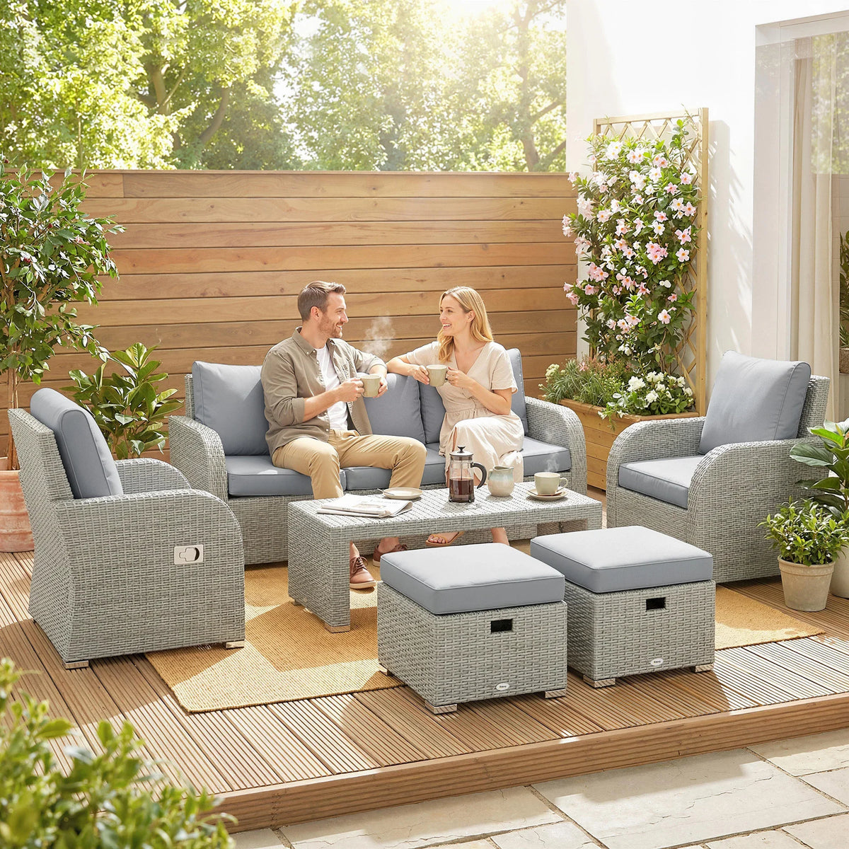 Outdoor rattan patio set with recliner chairs and ottoman coffee table, dark gray