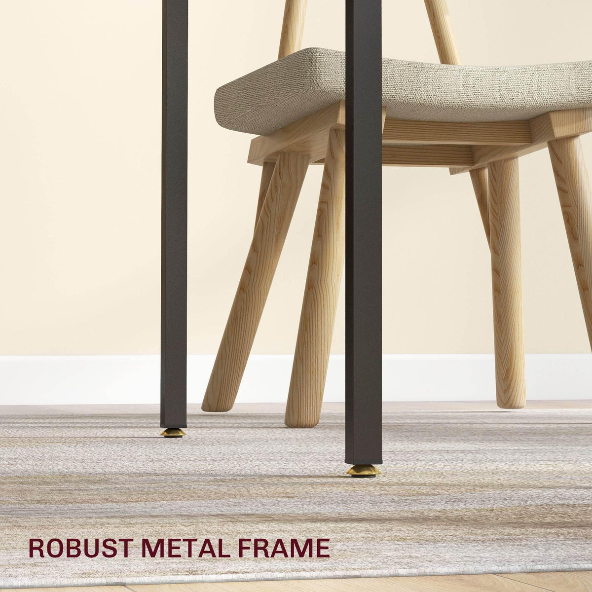Close-up of black metal legs on a grey drop-leaf folding table