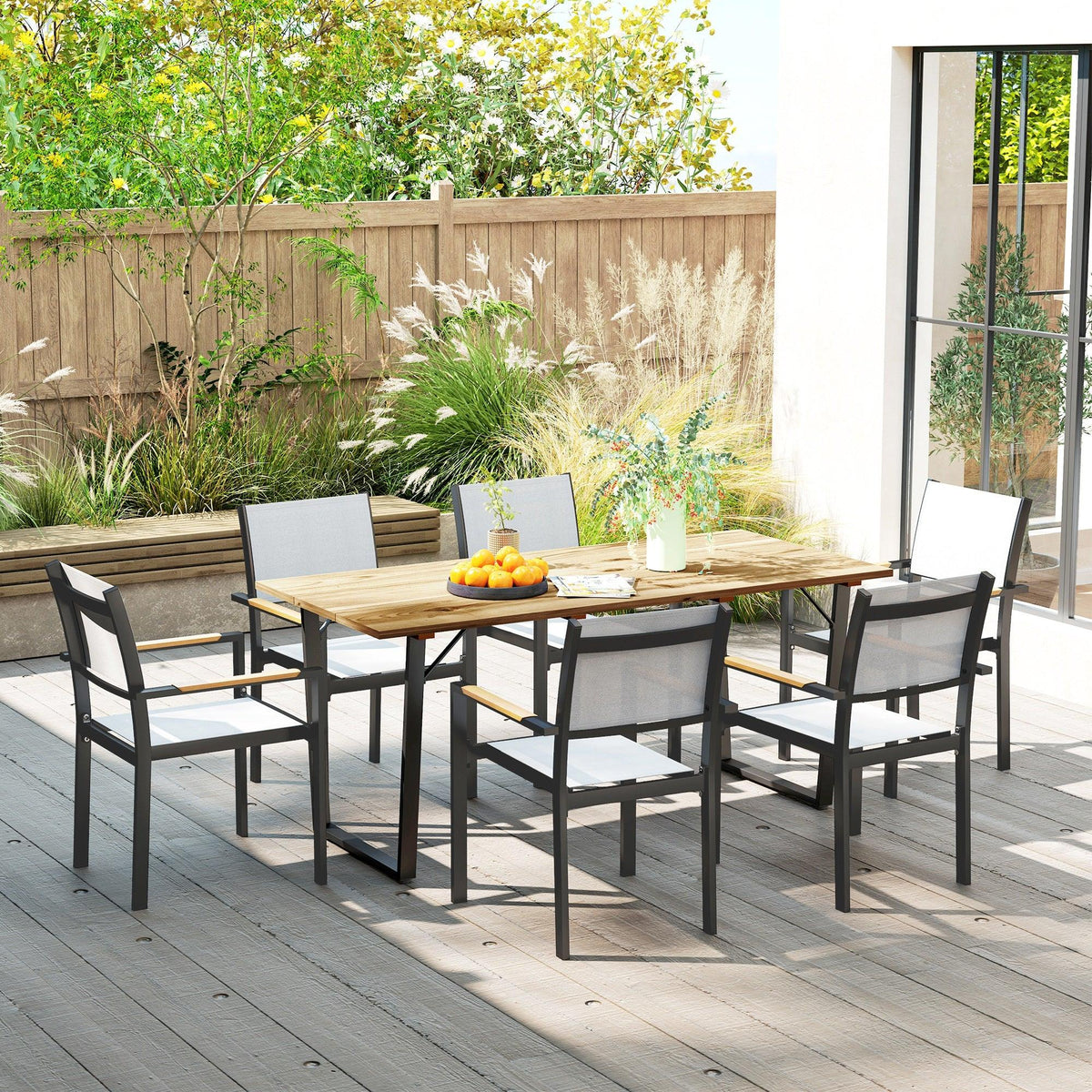 Outdoor garden dining table with brown slatted top and umbrella hole, dark legs, seating around