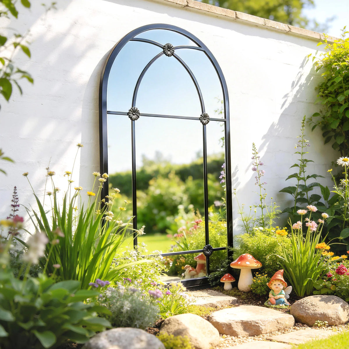 Arched wall mirror with black metal frame and windowpane-style acrylic glass