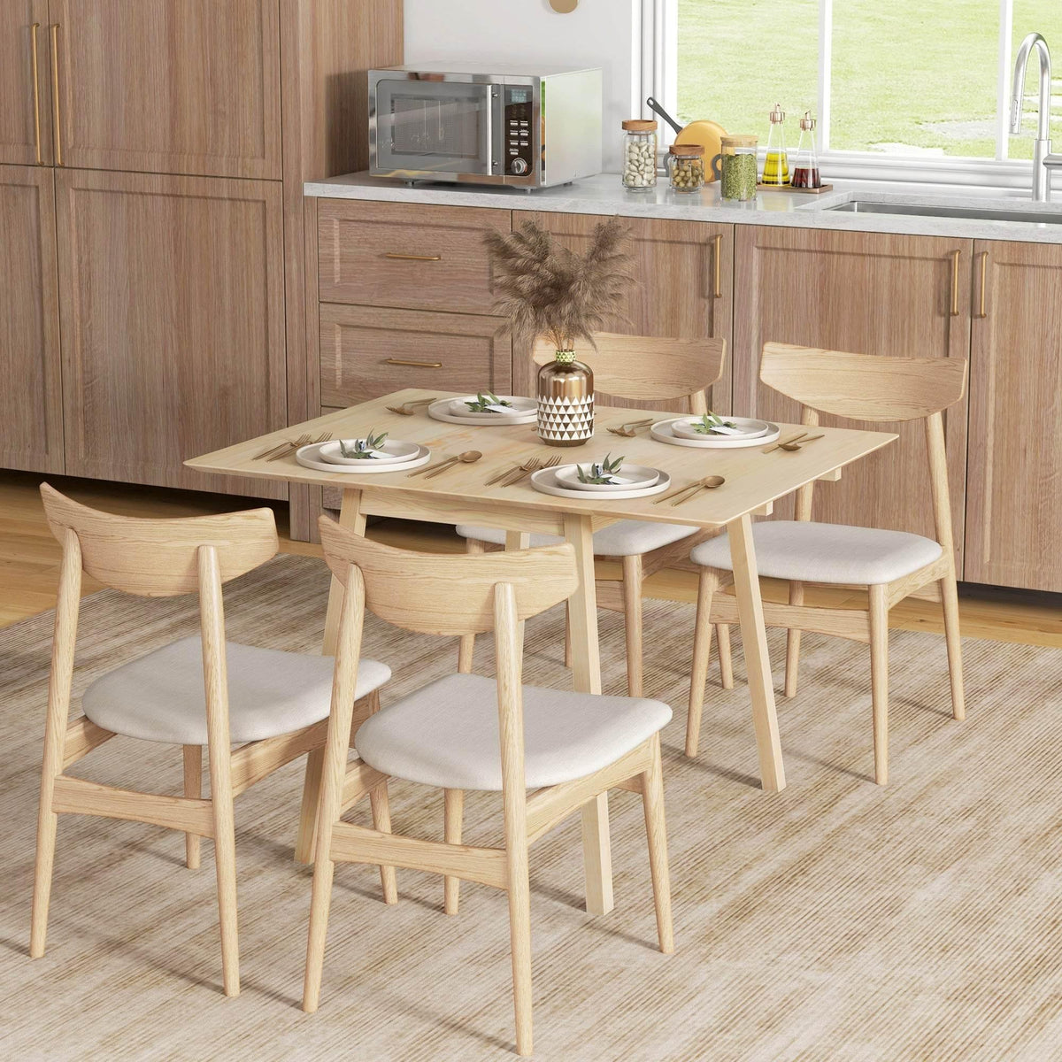 Natural pine drop-leaf dining table with four light wood chairs