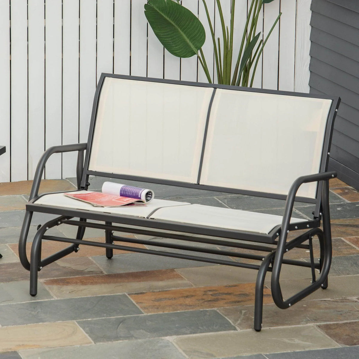 Beige mesh 2-person patio glider bench with dark steel frame and curved armrests
