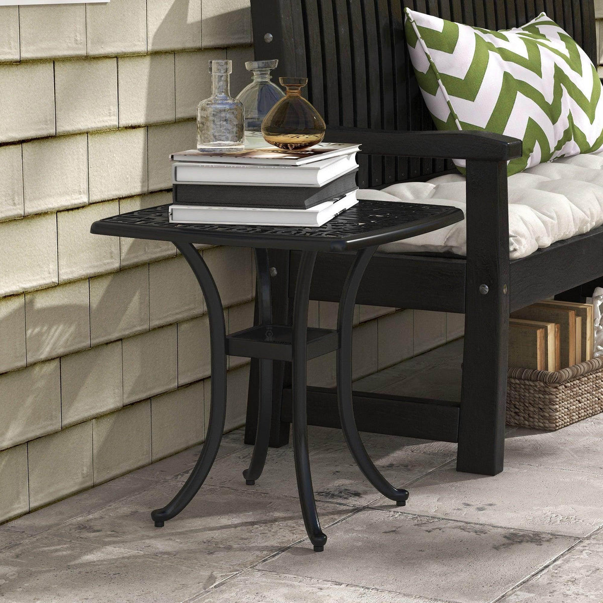 Black square cast aluminum bistro table with ornate lattice top