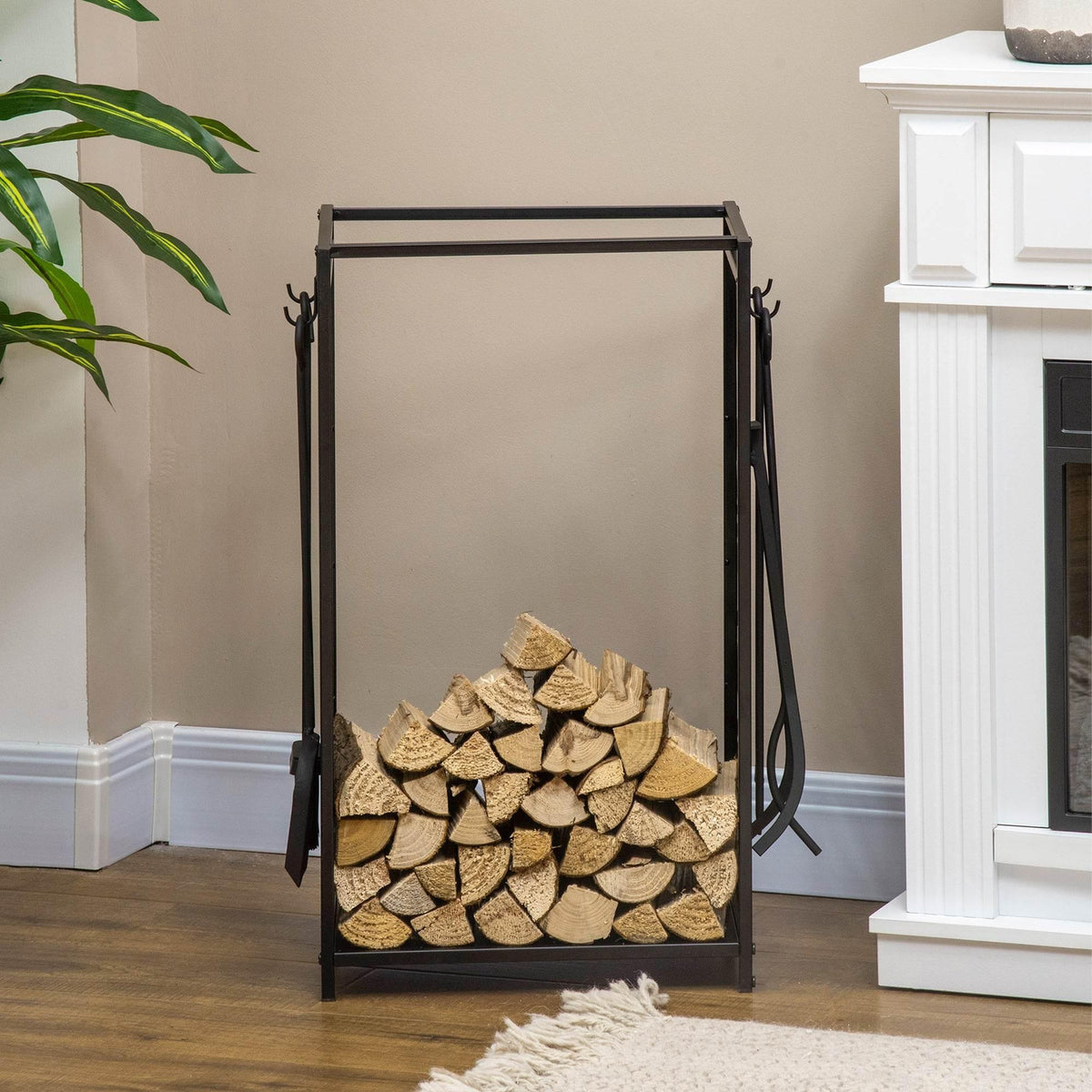 Black steel firewood rack with stacked logs inside an open top frame