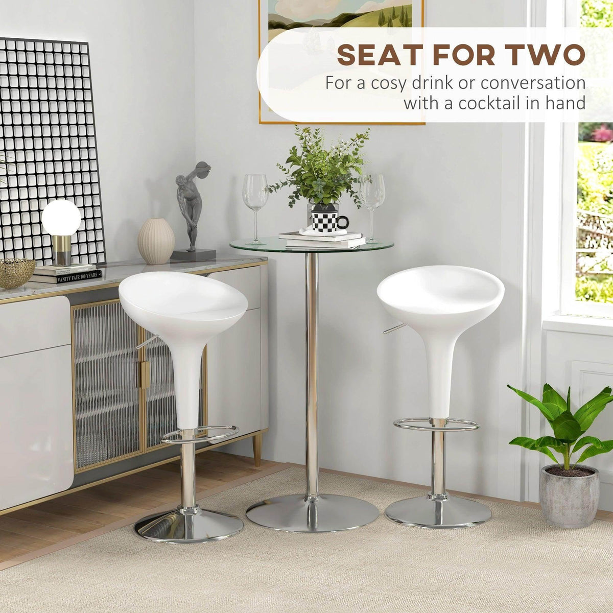 Round glass bistro bar table with chrome pedestal base and two white bar stools