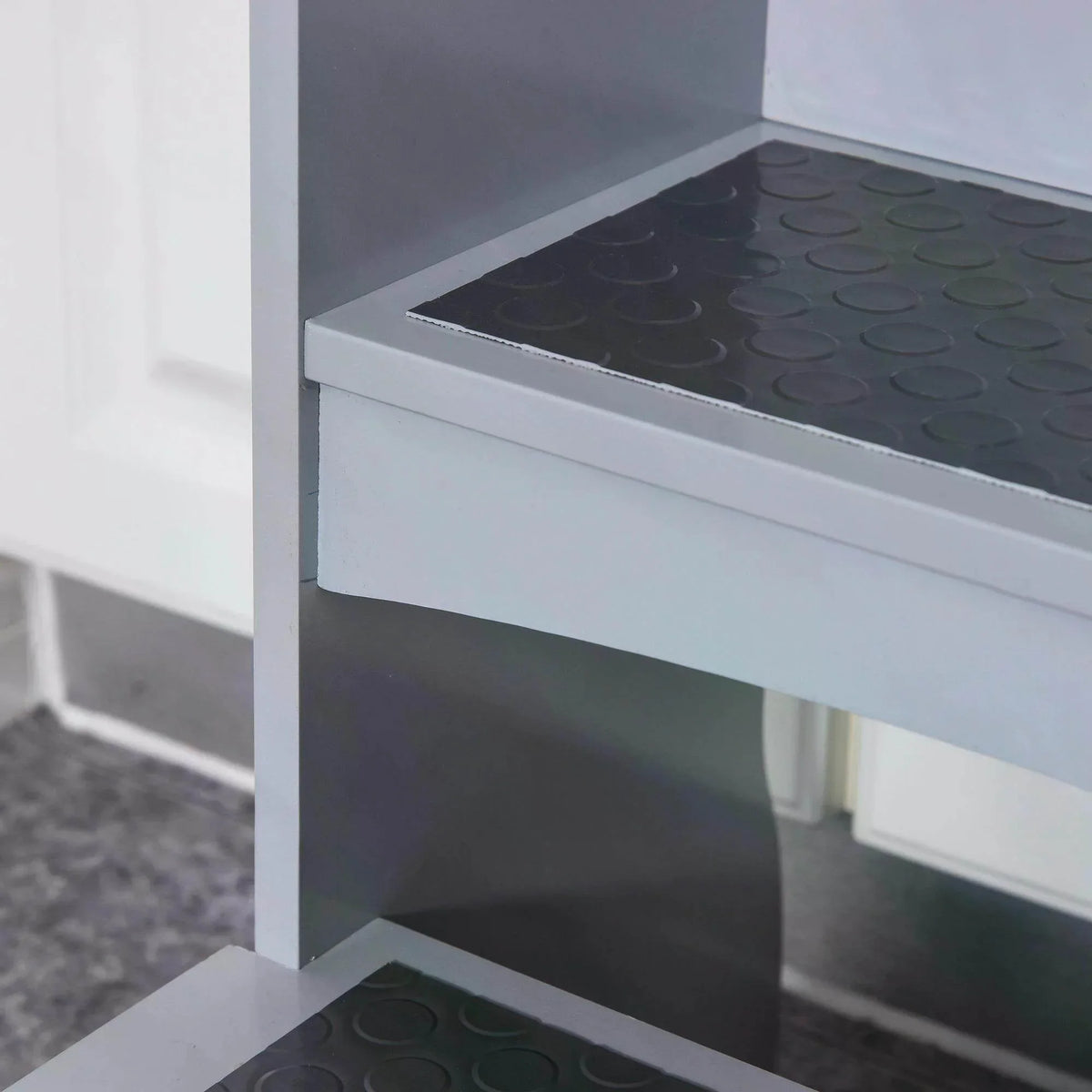 Grey step stool top platform with textured non-slip step surface