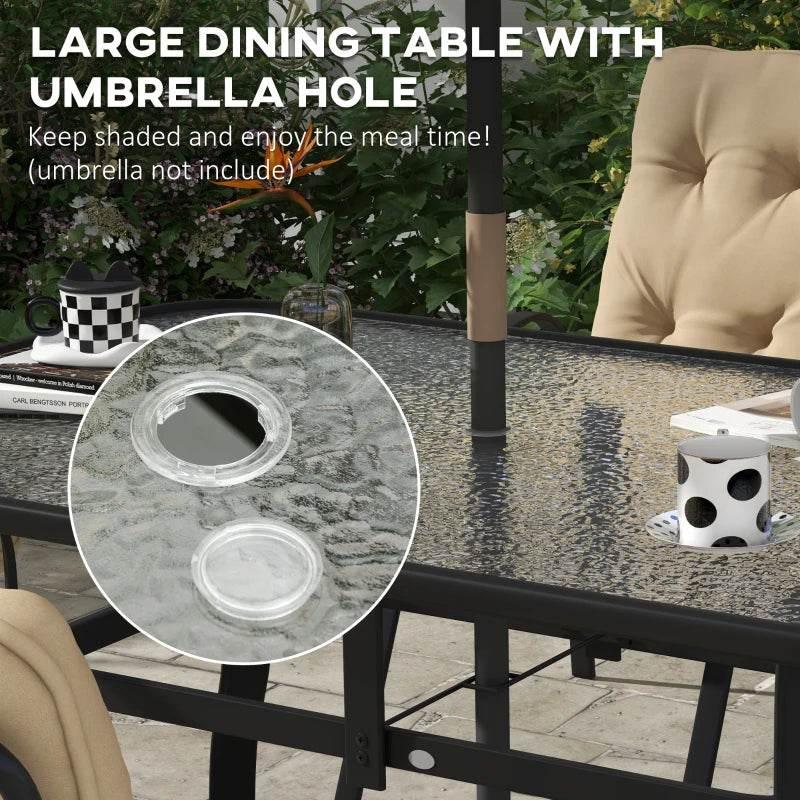 Tempered glass dining table top with umbrella hole and beige armchair nearby