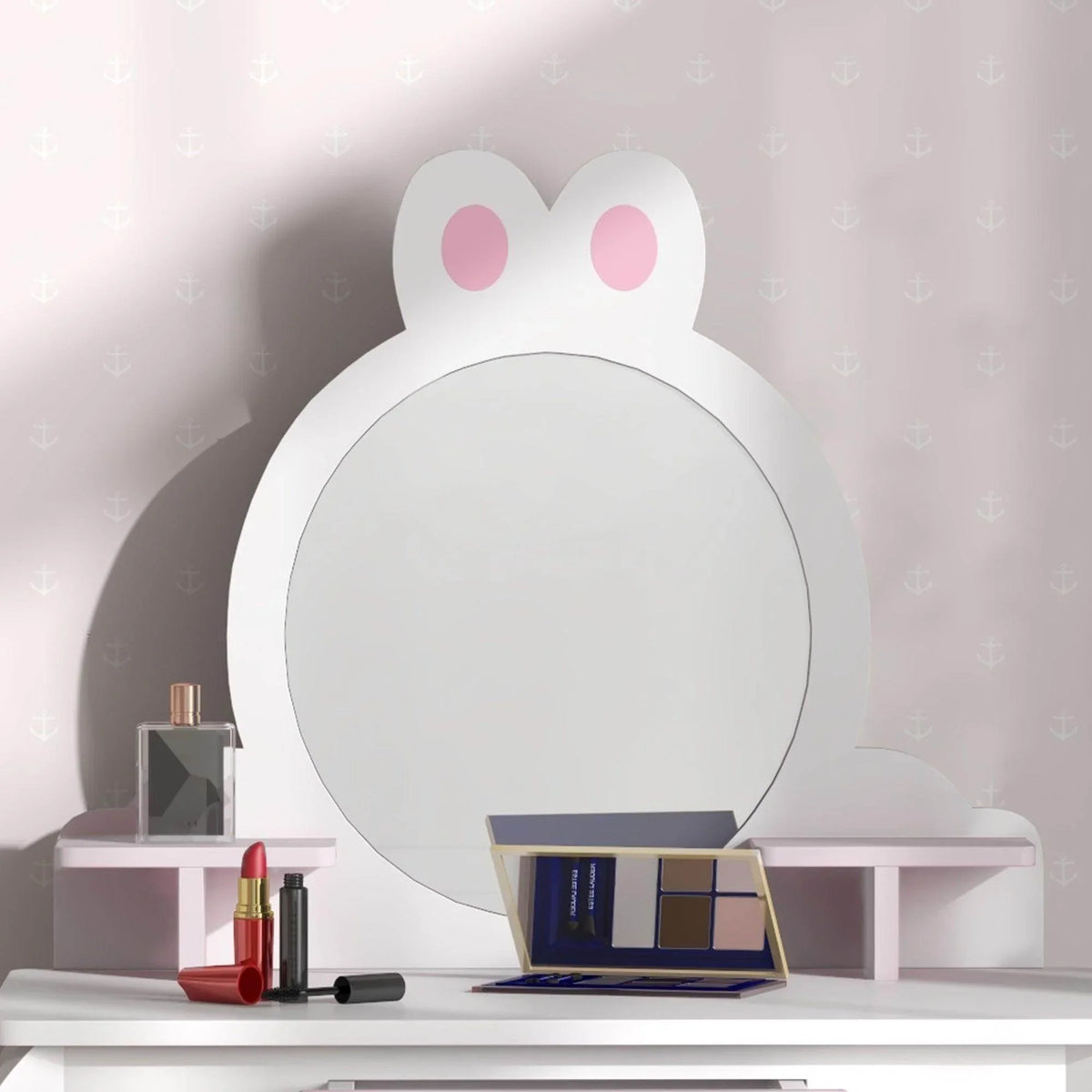 Bunny-shaped vanity mirror on kids dressing table with makeup set