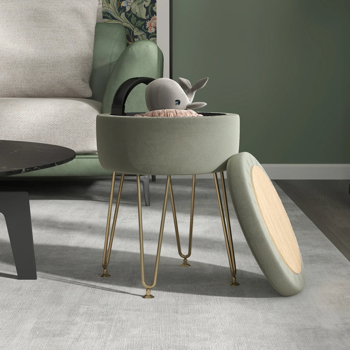 Green velvet storage ottoman with open round lid and gold hairpin legs