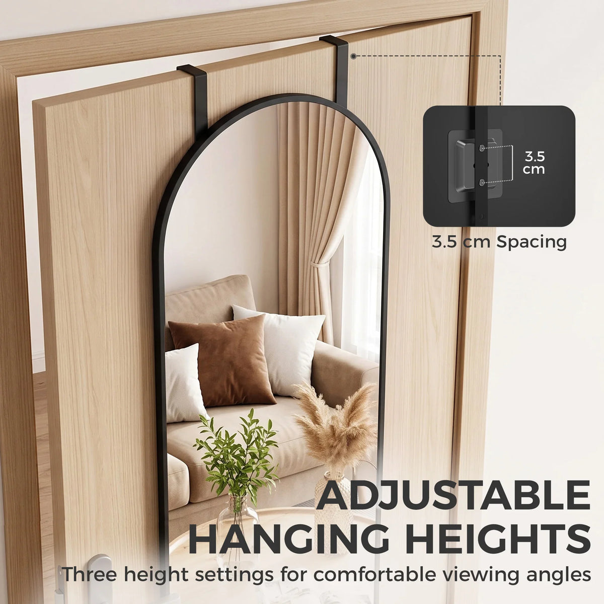 Arched wall mirror with black frame and adjustable hanging hook brackets behind