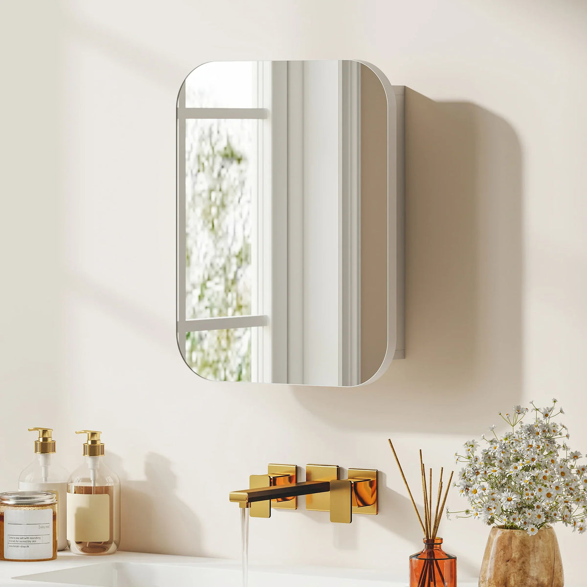 Wall-mounted white medicine cabinet with rounded-corner mirror and soft-close hinges