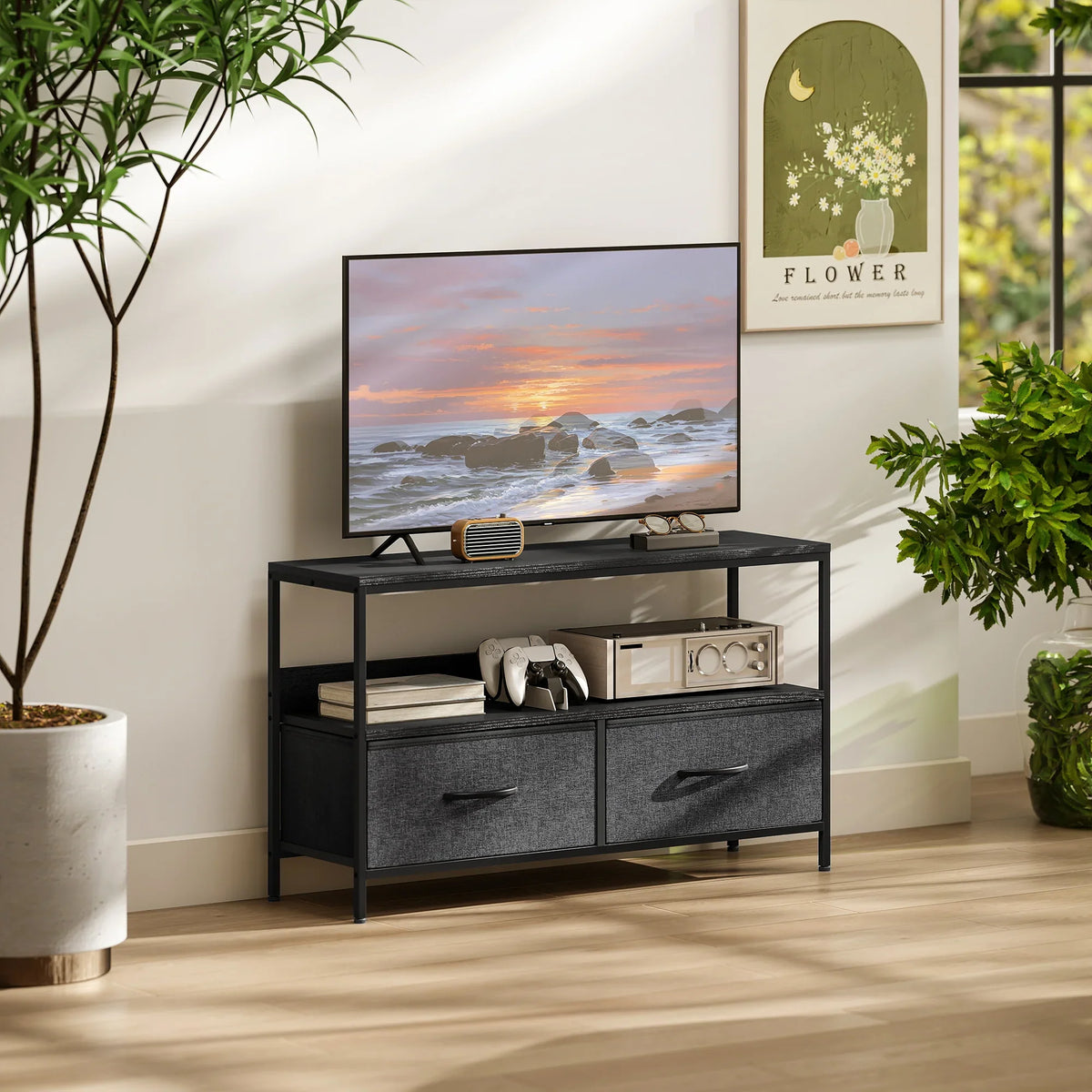 Two-tone black TV stand cabinet with two foldable drawers and open media shelves.