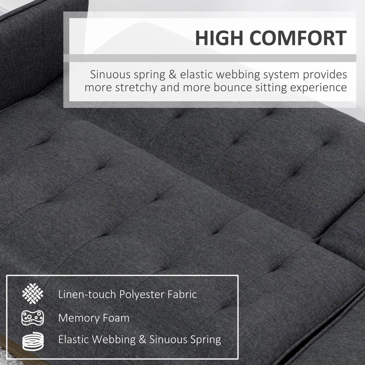 Dark grey tufted sofa upholstery with thick padded seat cushions
