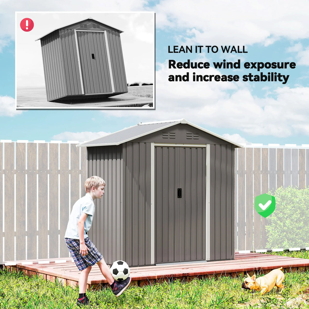 Light grey storage shed shown leaning to wall for reduced wind exposure and better stability