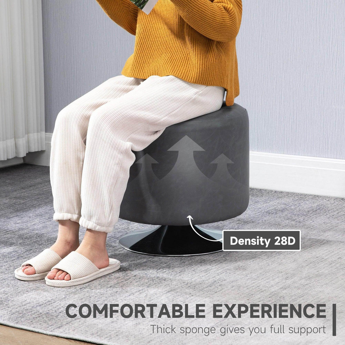 Gray cushioned footstool with thick padding, used as a comfortable footrest