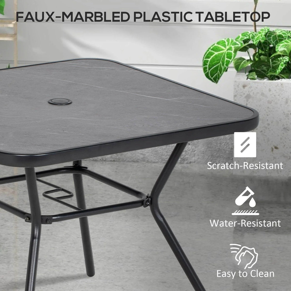 Close-up of dark gray faux-marble plastic tabletop with curved edge and black frame