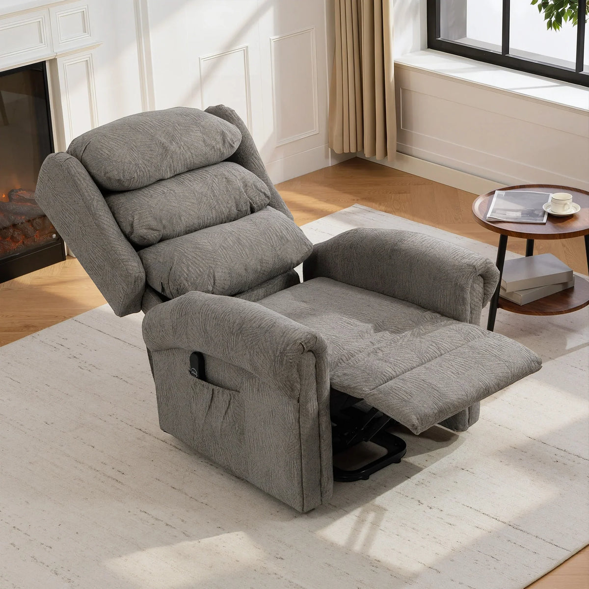Dark gray power recliner chair with reclined seat and elevated footrest