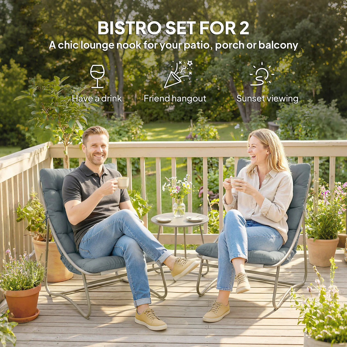 Dark grey bistro set for two with round table and cushioned lounge chairs outdoors