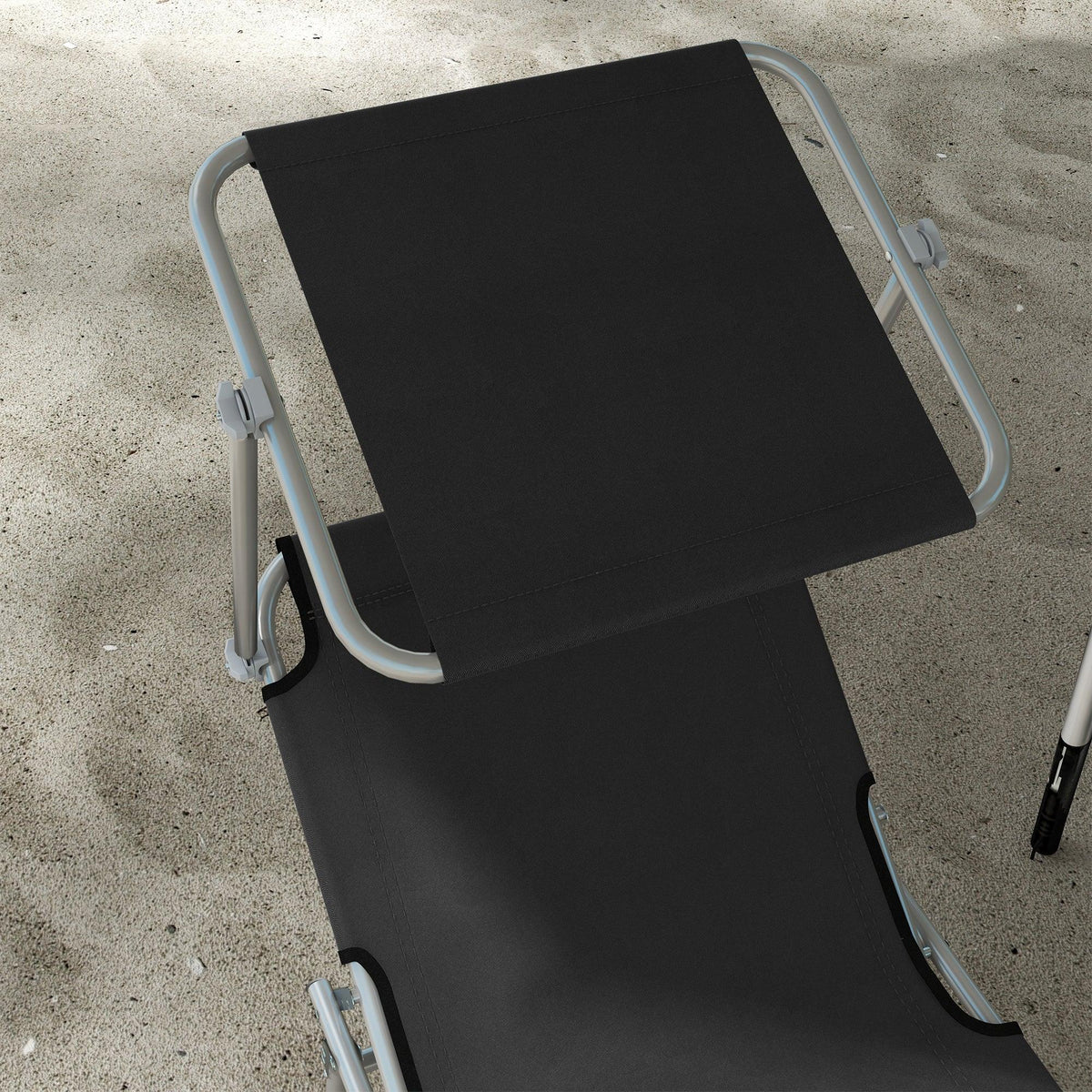 Black foldable sun lounger with adjustable backrest and gray metal legs