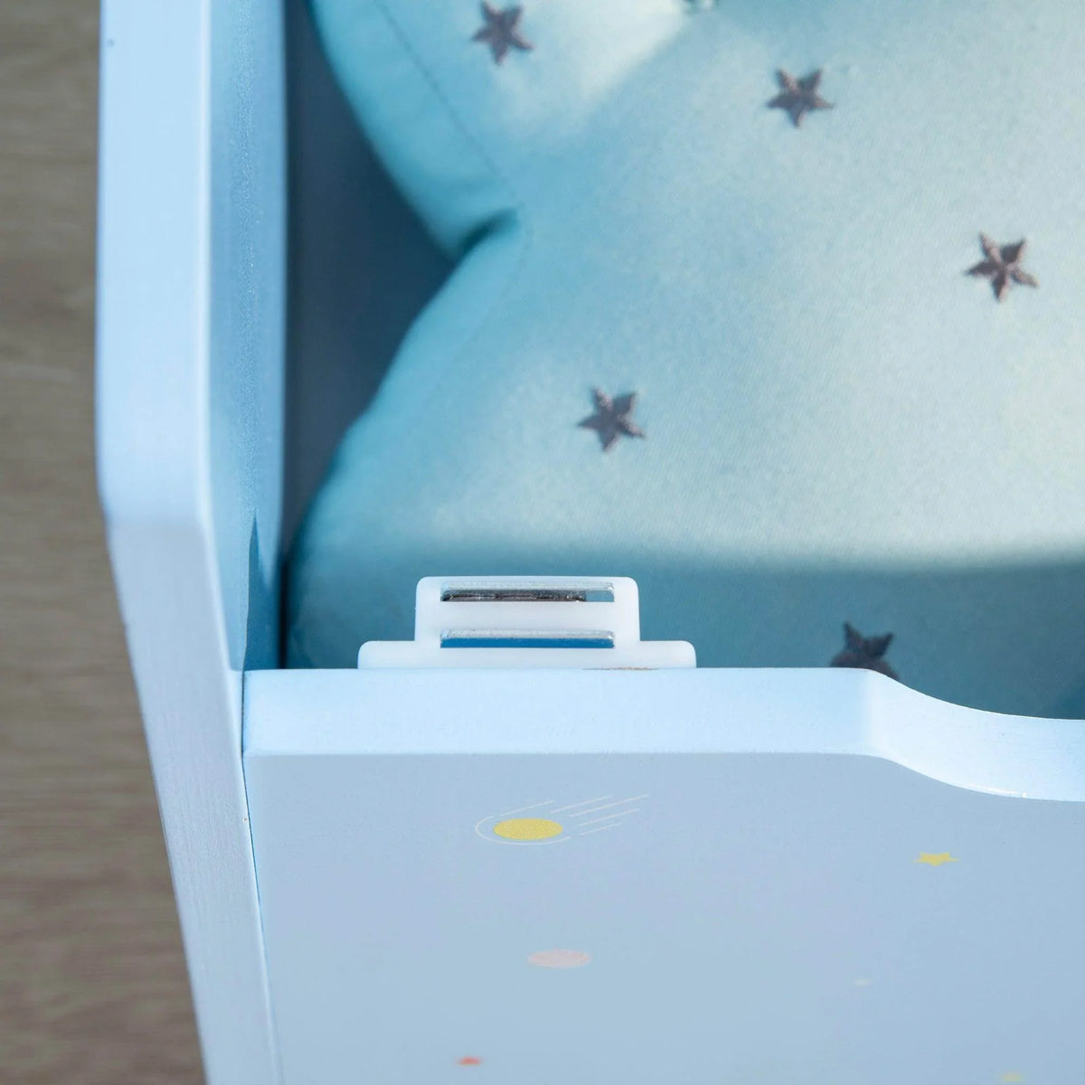 Kids blue low bed side panel with star print and smooth white safety edge
