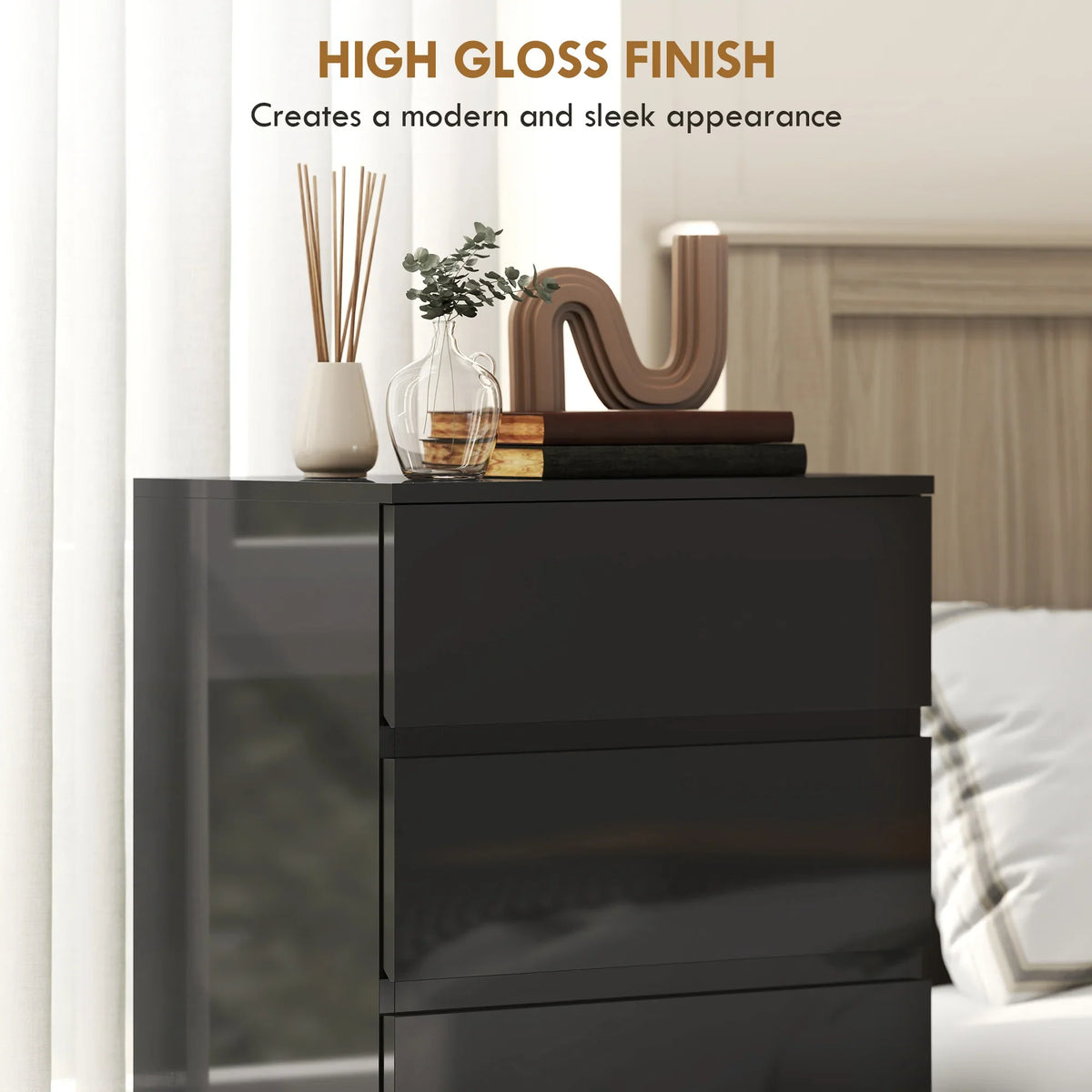 Black high-gloss dresser chest with sleek drawer fronts and a modern panel design