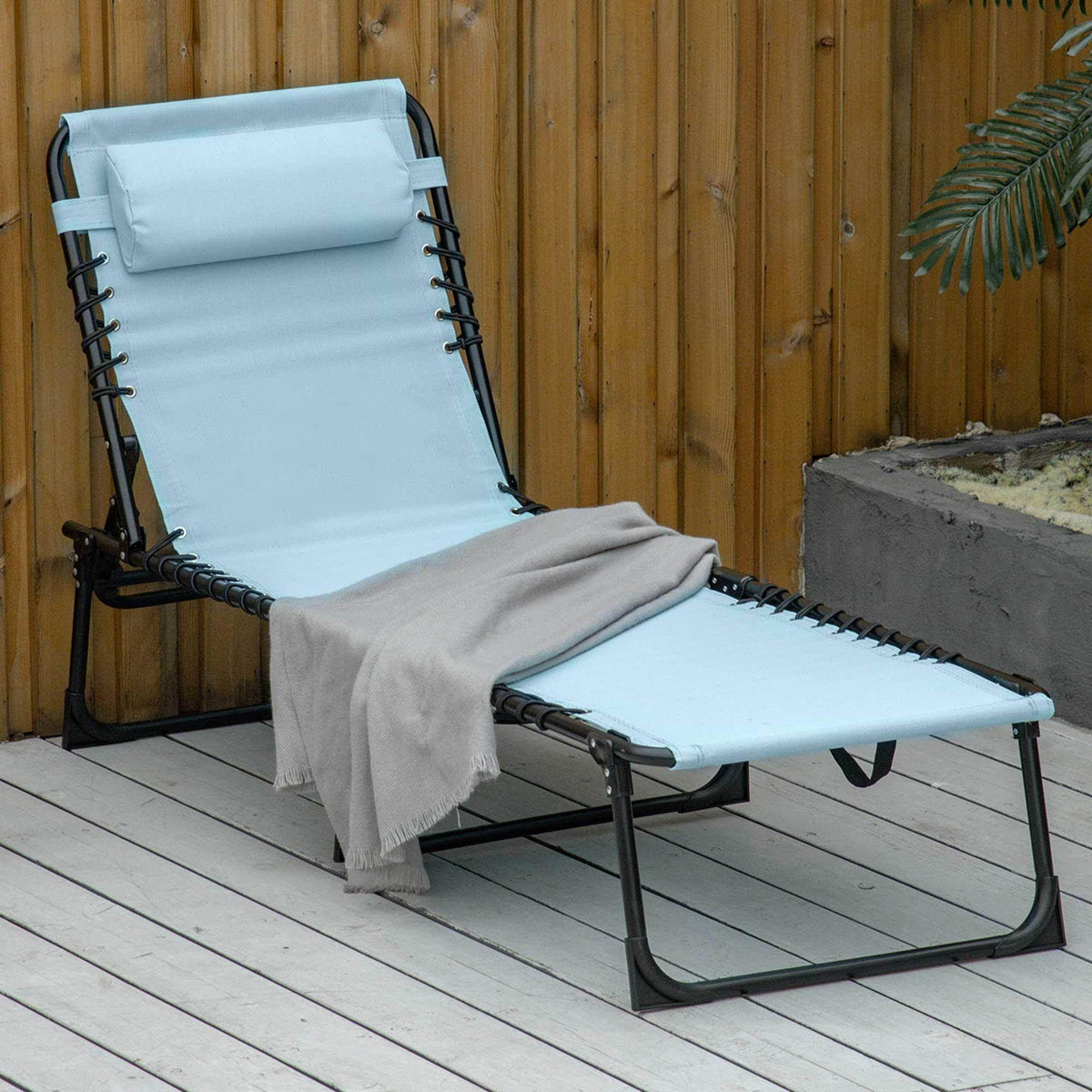 Light blue folding sun lounger with black steel frame and reclined mesh seat
