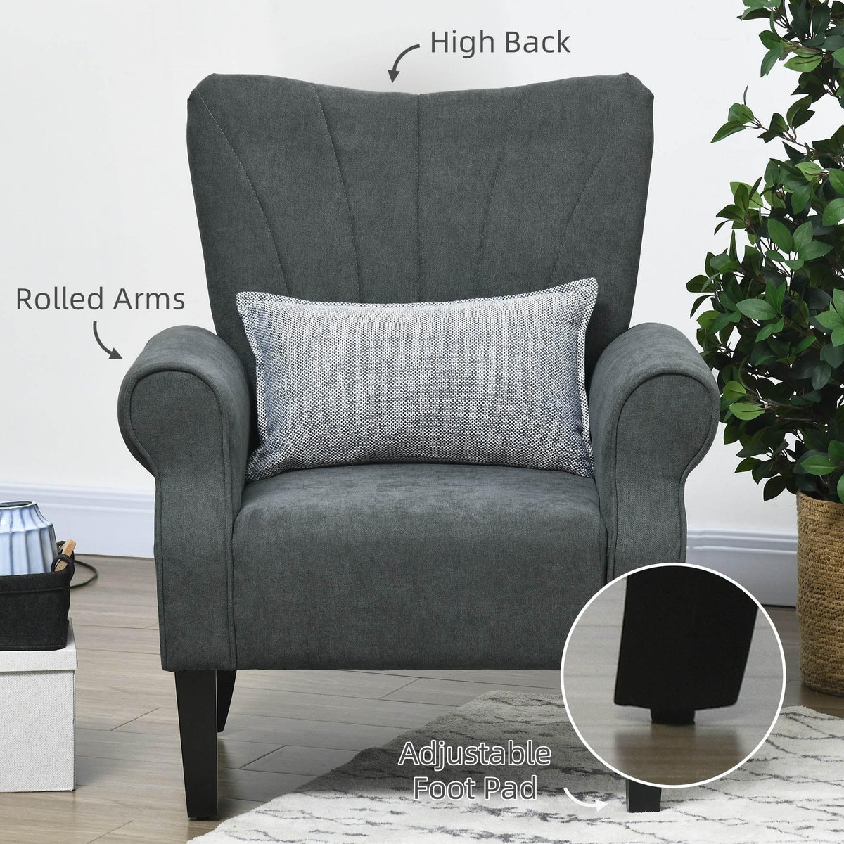 Grey high-back armchair with rolled arms, cushioned seat and adjustable foot pad