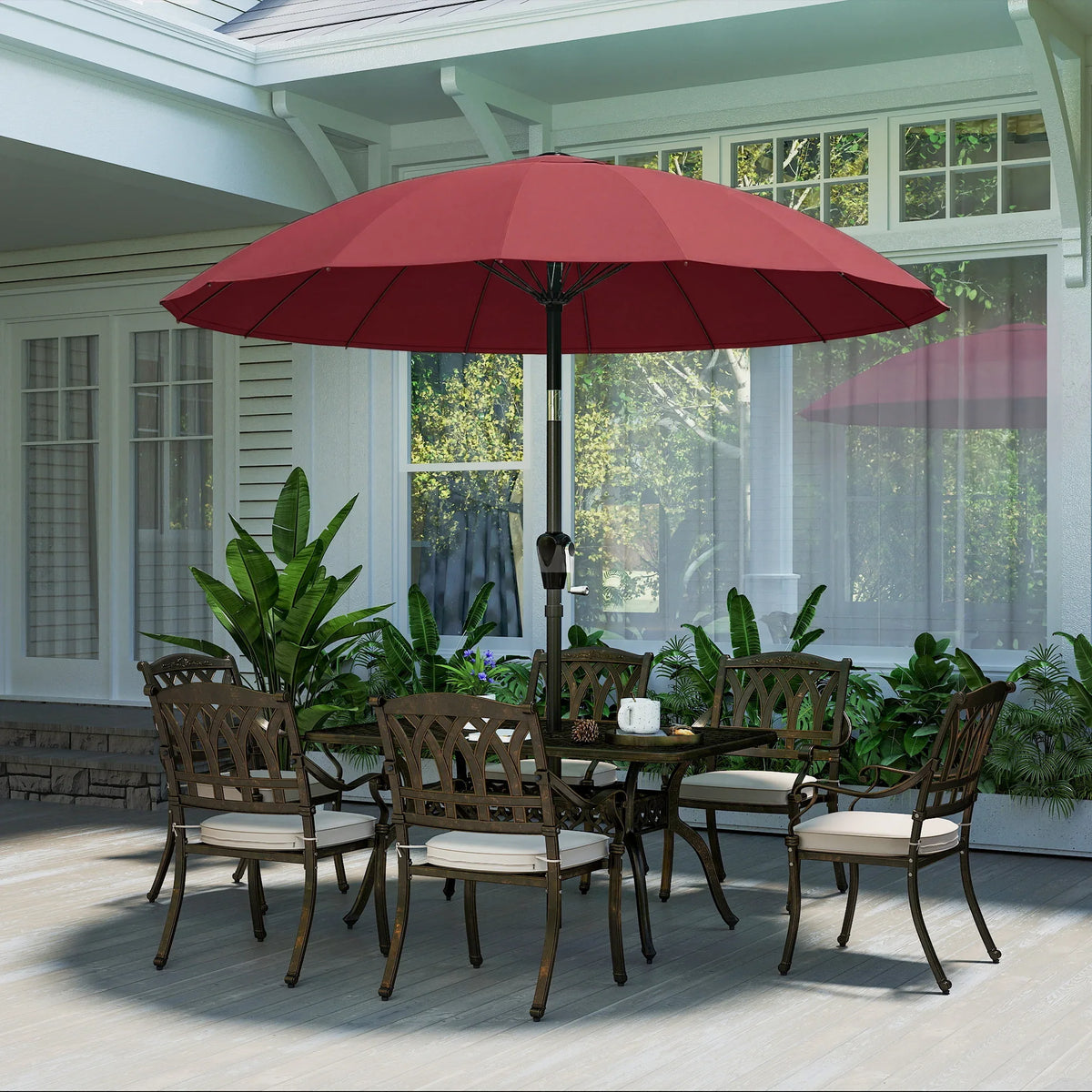 Wine red cantilever-style patio parasol umbrella centered over outdoor dining chairs