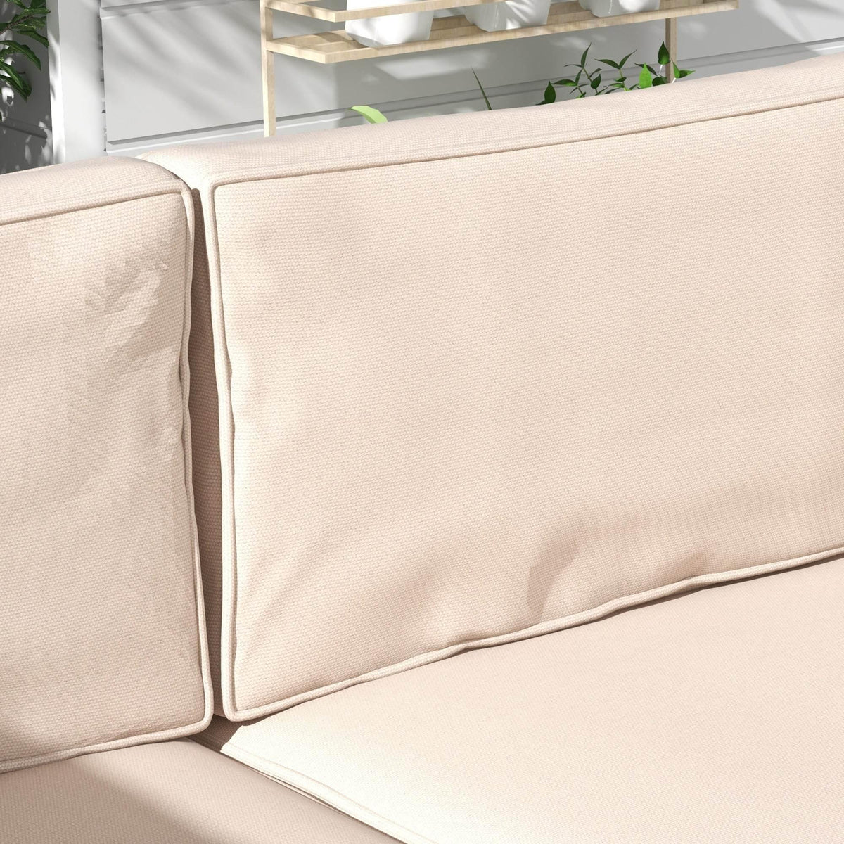 Beige outdoor cushion set corner, side panel with piping and seams